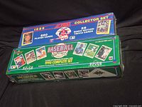 Upper Deck 1990 and Score 1989 sealed baseball card set boxes stacked