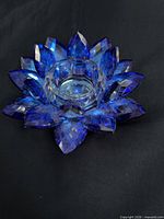 Top view of blue and clear crystal lotus tealight holder