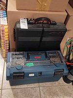 Closed Jobmate case and blue hardware toolbox