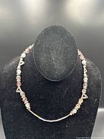Necklace displayed on bust showing full strand