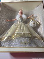 Front view of boxed Celebration Barbie doll with ornament