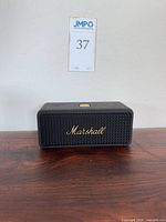 Front view showing Marshall logo and grille