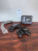 Console, two controllers, HDMI cable overview