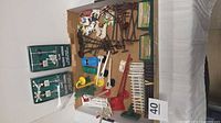 Overview of entire lot inside a box showing fences, animals, poles, gates, boxed signals