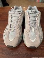 Top view of both sneakers showing laces, uppers and condition