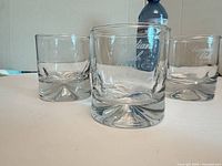 Front view of three Canadian Club rocks glasses