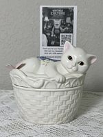 Overall view of porcelain trinket box with cat lid