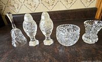bell, salt & pepper shakers, sugar bowl, bud vase displayed