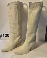 Side view of both boots showing color, stitching, heel