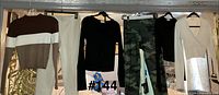 All six garments hanging on rod (#144)