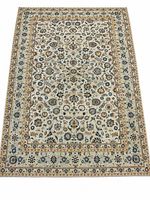 Full view of antique Kashan rug showing complete all-over floral pattern