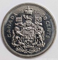 Reverse of 1972 Canadian 50 cent coin showing coat of arms