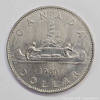 Reverse view showing canoe Voyageur design and date 1980