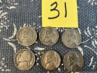 Front view of six Jefferson nickels showing obverses