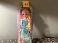 Full packaged Elsa doll front view