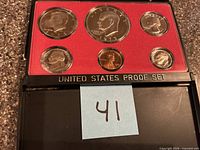 Full view of six-coin proof set in case