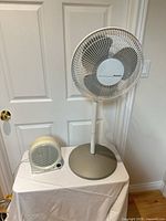Holmes pedestal fan and Honeywell tabletop heater together