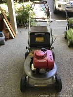 Front view of Honda HR215 gas lawn mower