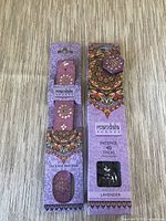 Two packaged Mandala Scents items: incense sticks box and incense holder