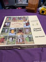 Front of Nature Calls jigsaw puzzle box showing collage imagery and piece count