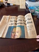 Front page opened showing headline and Churchill portrait