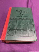 Front cover of Whitaker 1932 almanac showing title and printed calendar