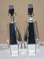 Front view of both mirrored lamp bases