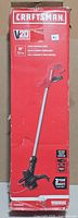 Front of box showing Craftsman V20 cordless string trimmer
