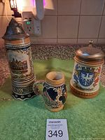 All three steins front view