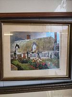 Full view of framed cottage landscape foil art