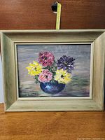 Full view of framed floral painting