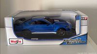 Front/side view of boxed Maisto 1:18 2020 Mustang Shelby GT500