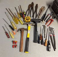 All hand tools laid out on floor