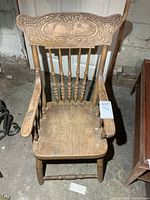 Full front view of child’s press-back armchair