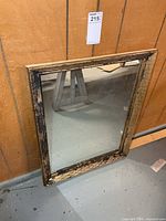 Front view of rectangular mirror showing full frame and glass