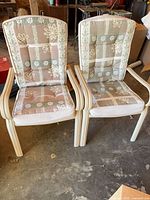 Front view of both chairs showing frames and cushions