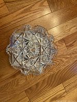 Top view of cut glass bowl showing pattern and rim