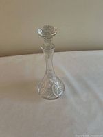 Full view of crystal decanter with stopper fitted
