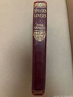 Spine showing maroon leather, gilt title and publisher