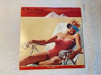 Front sleeve artwork of Rolling Stones “Made In The Shade” LP