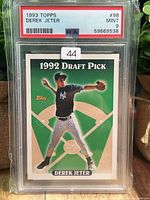 Front of PSA-slabbed Derek Jeter #98 Draft Pick card showing grade label PSA 9 Mint and card design