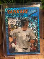 Front of Ben Rice holographic blue sparkle refractor Topps card in protective sleeve