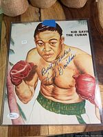 Full view of signed Kid Gavilan poster in sleeve