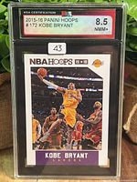 Front of graded 2015-16 Panini Hoops #172 Kobe Bryant card in KSA slab