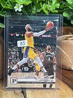 Front of LeBron James Panini Chronicles #112 card in sleeve/toploader