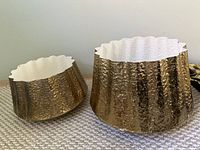 Both hammered gold planters side by side showing size difference