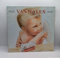Front cover with cherub artwork and Van Halen title