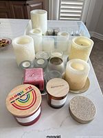 Overview of assorted candles on countertop