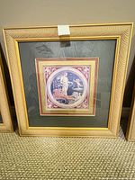 Front view of framed lithograph showing full artwork and frame