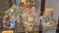 All crystal items grouped together in display cabinet